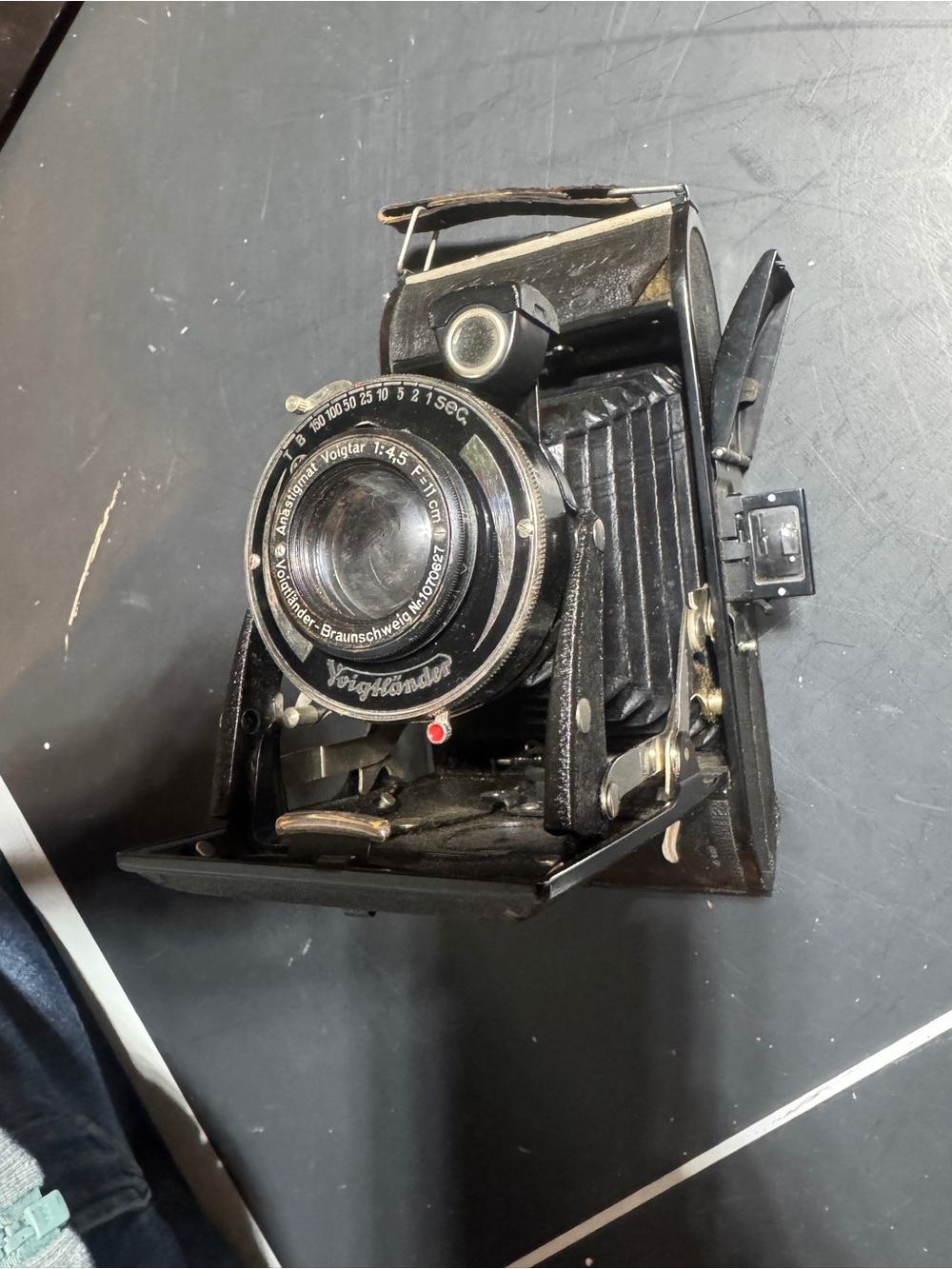 Folding bellows camera by Voigtländer and leather case